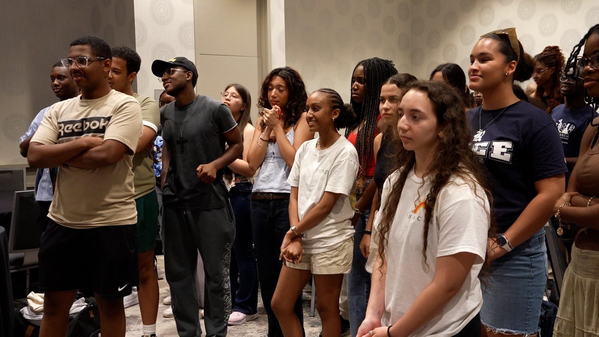 Group of students listening during a debate at the 2025 Legacy Retreat